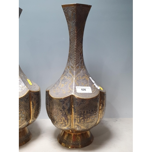 626 - A pair of Islamic brass and inlaid hexagonal Vases with engraved trailing leafage design 1ft 4in H (... 