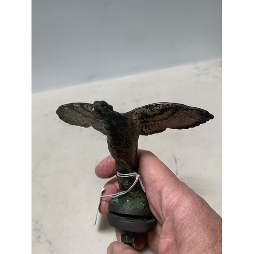 63 - A cold painted bronze Car Mascot in the form of a Pheasant in Flight, 3 1/2 in H including fitting, ... 