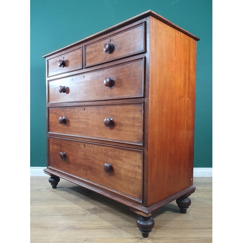 649 - A mahogany Chest of two short over three long graduated drawers, raised on turned bun supports, 3ft ... 