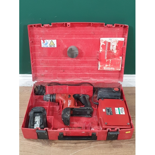 655 - A Hilti TE-6-A Hammer Drill, two batteries and a Charger, in carry case. (R8).