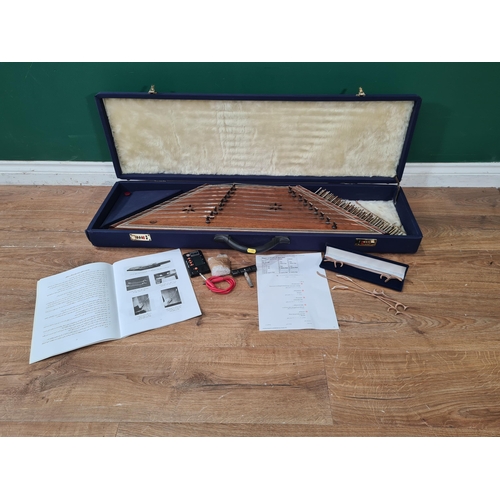 685 - A double side S. Sadeghi Santoor in fitted blue carry case and book of music. (R8).