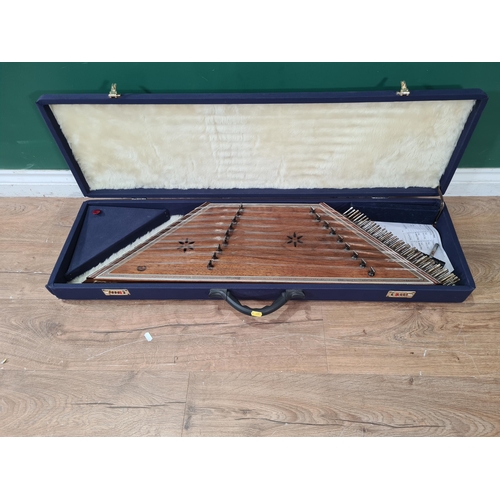 685 - A double side S. Sadeghi Santoor in fitted blue carry case and book of music. (R8).