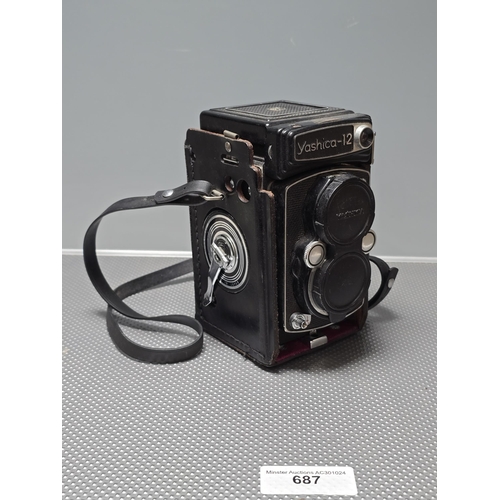 687 - A Yashica 12 Double Lens Reflex Camera in Case  (R7)