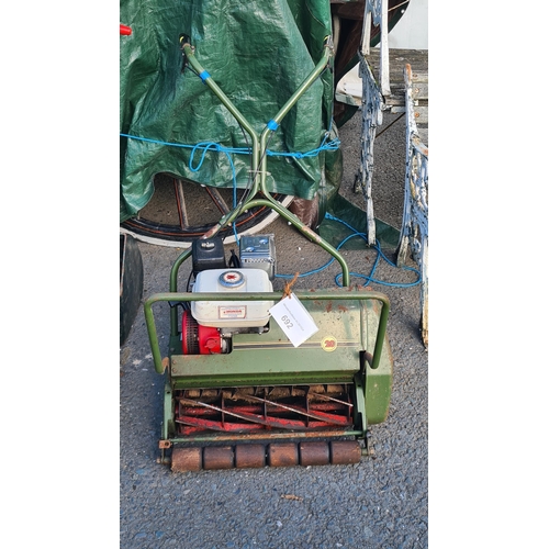 692 - A Cylinder Mower powered by a Honda Engine (no grass box)