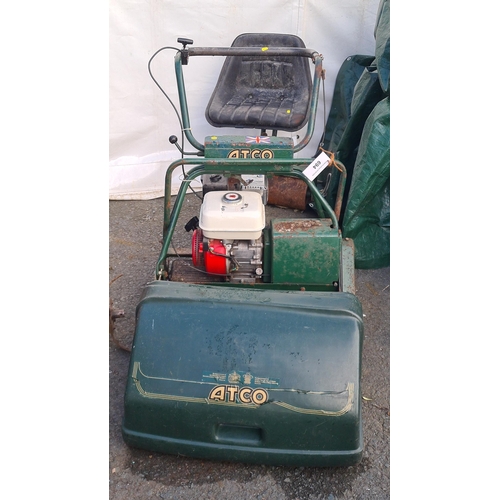 694 - An Atco Cylinder Ride-On Mower with seat roller and collection box