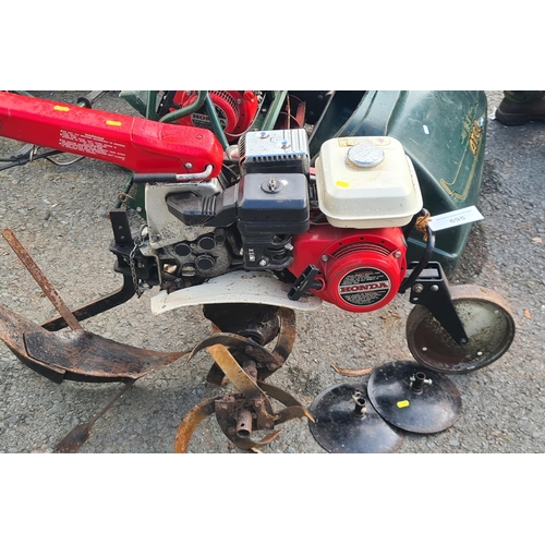 695 - A Honda F380 Rotavator with some accessories