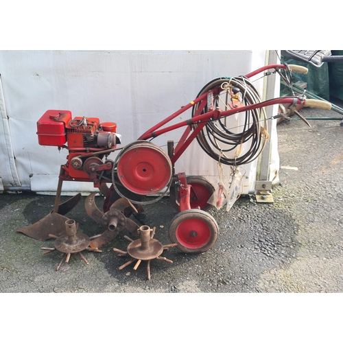 696 - A Wolseley Merry Tiller with Briggs and Stratton Engine and with some accessories