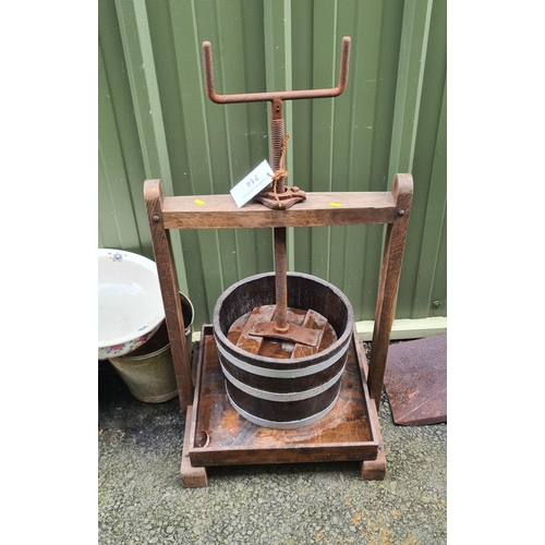 714 - A wooden Apple Press Stand