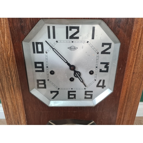 728 - A French Deco style Wall Clock with octagonal dial, 25