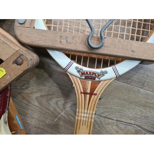 738 - Four Vintage Tennis Rackets including Dunlop and Slazenger. (R9).