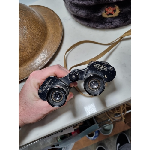 746 - A British Tin Helmet, a Russian Fur Hat and a pair of Taylor-Hobson No.2 Mk.III Binoculars (R9)