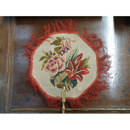 753 - A collection of antique Face Screen Fans, including one with an early Map of Herefordshire covering ... 