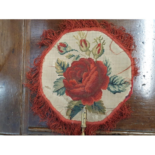 753 - A collection of antique Face Screen Fans, including one with an early Map of Herefordshire covering ... 