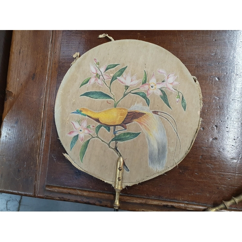 753 - A collection of antique Face Screen Fans, including one with an early Map of Herefordshire covering ... 