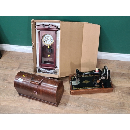 755 - A Singer Sewing Machine and a Wall Clock (R9)