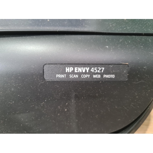 757 - An HP Envy 4527 Printer with Ink Cartridge (R9)
passed PAT