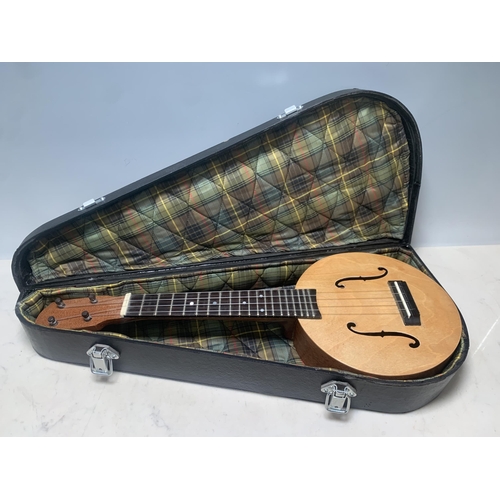 784 - A Ukulele in case (R5)