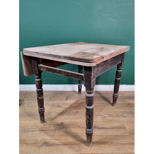 8 - A Victorian scrub top pine dropleaf Kitchen Table on stained supports 3ft 2in W x 2ft 6in H, and a m... 