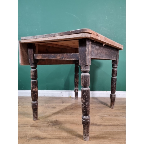 8 - A Victorian scrub top pine dropleaf Kitchen Table on stained supports 3ft 2in W x 2ft 6in H, and a m... 