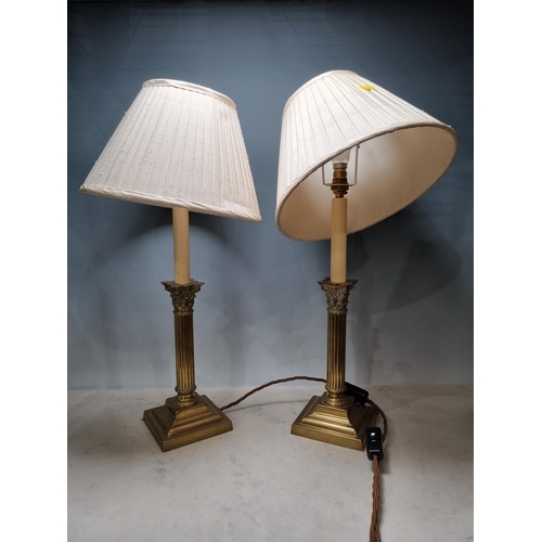 807 - A pair of brass Corinthian column Table Lamps and shades 2ft H (R10)
passed PAT