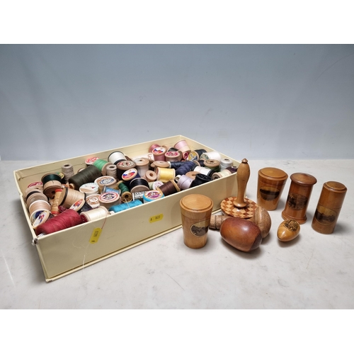 810 - A box of assorted Cotton Reels and a collection of Treen/Mauchlin  Needle Cases. (R8).