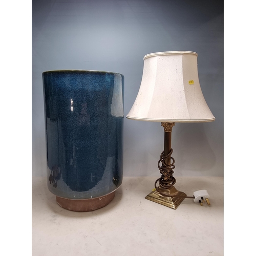 814 - A blue glazed ceramic Stick Stand and a brass Table Lamp and shade (R9)
passed PAT