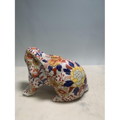 82 - A Japanese Imari Rabbit with all over floral and leafage designs, 5in H x 7 1/2 in L, (cab)