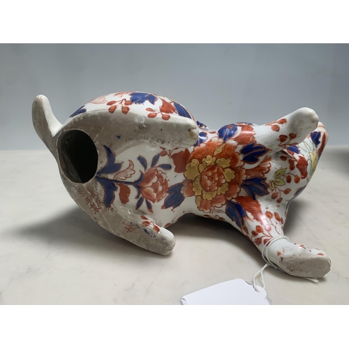 82 - A Japanese Imari Rabbit with all over floral and leafage designs, 5in H x 7 1/2 in L, (cab)