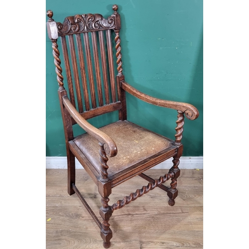 823 - A carved oak Elbow Chair with carved top rail 3ft 9in H (R7)