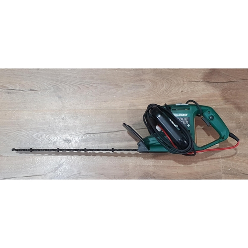 831 - A Qualcast Hedge Master 471 electric Hedge Trimmer (R7)
passed PAT