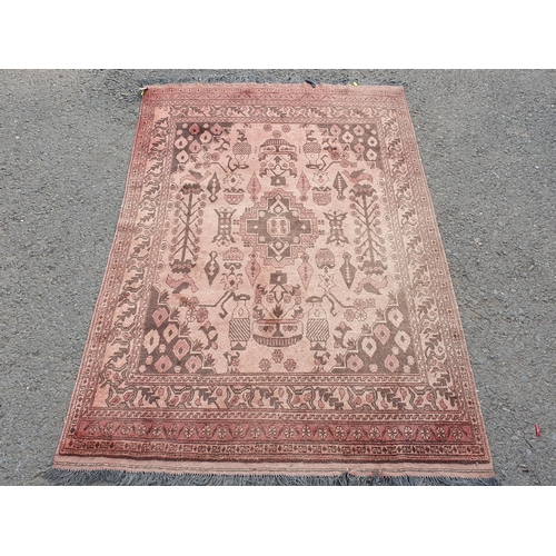 860 - A pale red multi-bordered Persian Rug with stylised design, depicting birds, 6ft 6in L x 4ft W