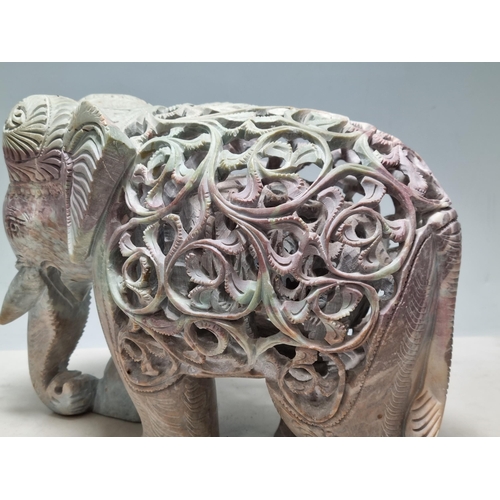 863 - Two carved soap stone Puzzle Elephants, A/F, 7