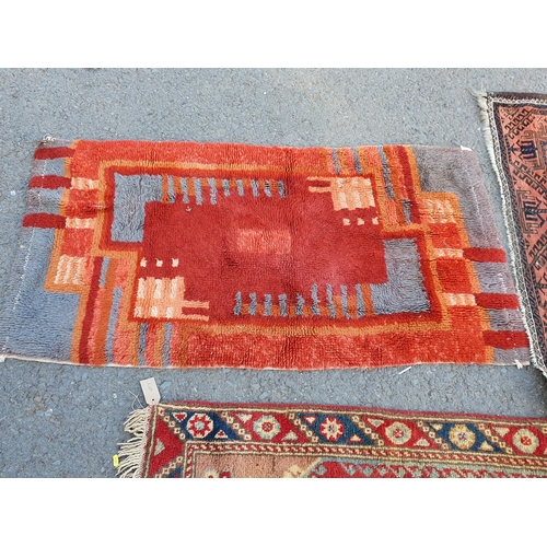 867 - A Runner on red ground with multi-floral borders with seven central stylised medallions, 10ft L x 2f... 