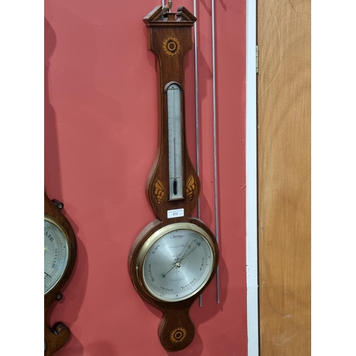 872 - A 19th Century mahogany and inlaid banjo Barometer with broken arch pediment and silvered dial by M.... 