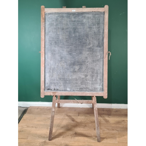 877 - A pine framed Easel and a large pine framed removable Blackboard/Noticeboard. (R6).