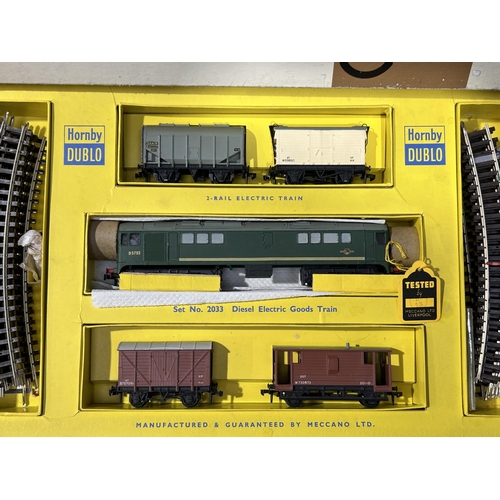 1014 - A boxed Hornby Dublo 2033 Co-Bo diesel Goods Set, contents M, have been lightly run, this is the ver... 