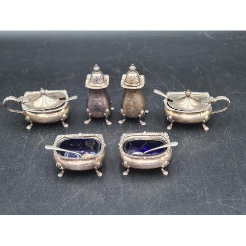 11 - An Elizabeth II silver six piece Condiment Set, Birmingham 1959, with four Spoons