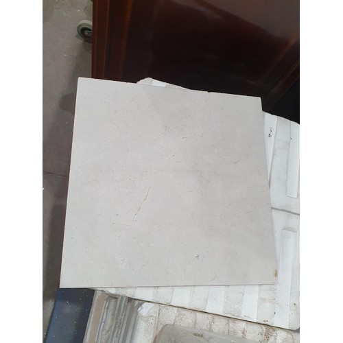 706 - A large quantity of Cream Marble effect Wall Tiles, (Tile Measures 1ft x 1ft). (R7).