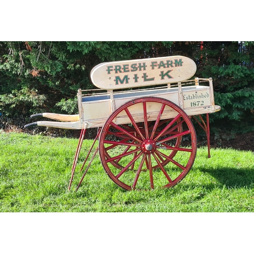 17 - An early 20th Century two wheeled Dairy Hand Cart with oval painted signs, inscribed 