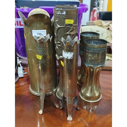 750 - Three pairs of brass Trench Art Vases with floral and hammered designs, and another single Vase. (R8... 