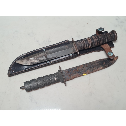 26 - A US M8A1 Bayonet with scabbard, a US Camillus Survival Knife with scabbard and another Knife (All A... 