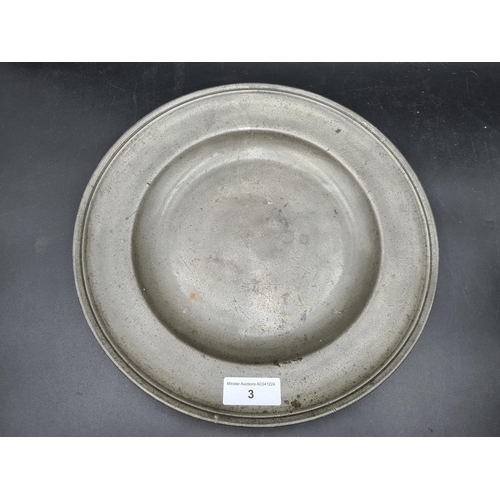 3 - An antique pewter Plate with touch marks to reverse, 12 1/2in diam