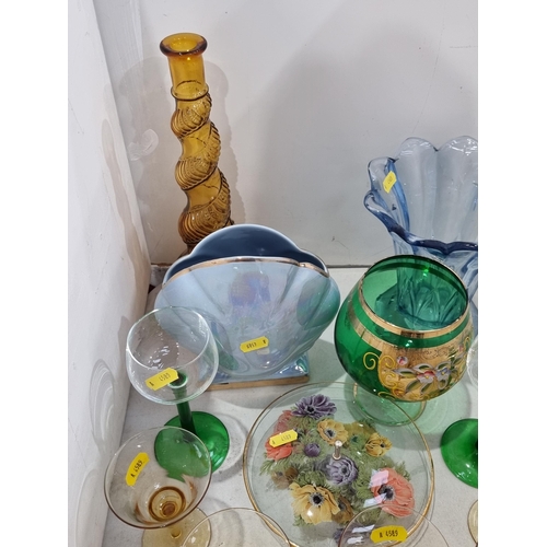 310 - A collection of coloured Glassware including, a French spiral design Bottle, an orange glass Tray Se... 