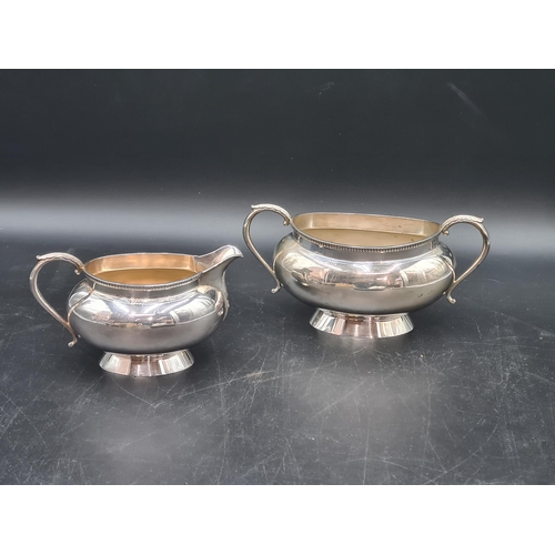 33 - An Elizabeth II silver oval Milk Jug and Sugar Bowl, Birmingham 1963, 430gms