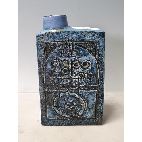 332 - A Troika Flask/Bottle decorated with geometric designs in blue and green glaze. 8