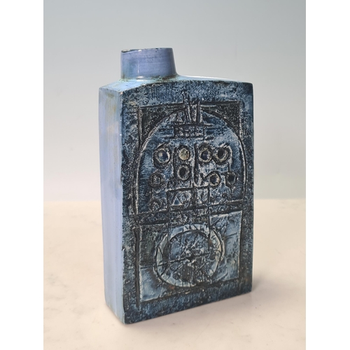 332 - A Troika Flask/Bottle decorated with geometric designs in blue and green glaze. 8