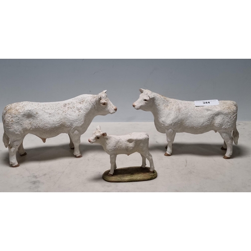 344 - A set of three 'North Light Hand-Craft' Sculptures, Charolais Bull, Cow and Calf, (R5)