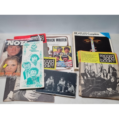 46 - Music related Ephemera to include, a framed Photograph of T-Rex, Beatles Books 