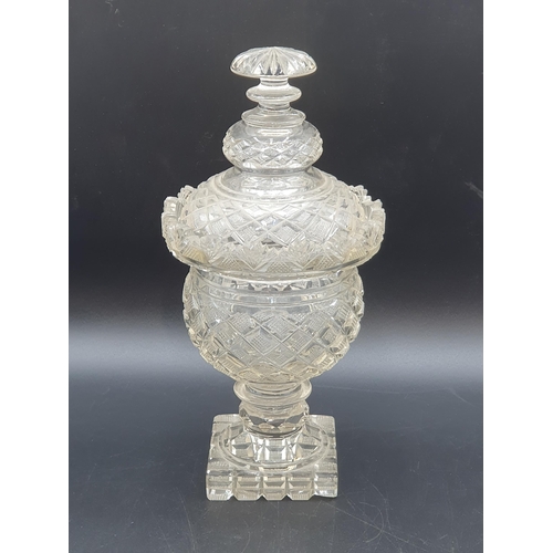 51 - A Regency style cut glass Sweet jar and Cover with hobnail and fan design, on a square base. (R1)