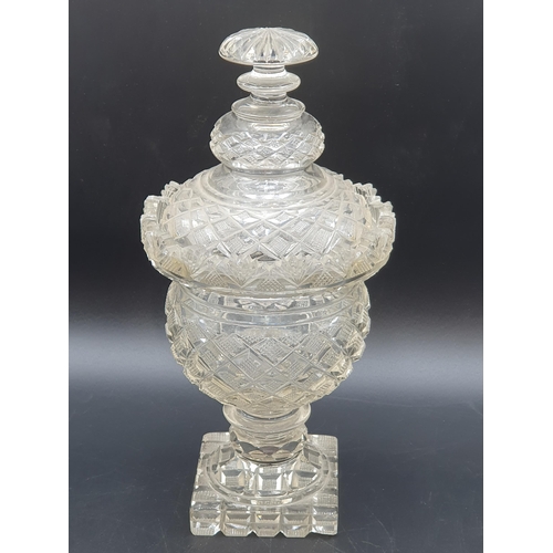 51 - A Regency style cut glass Sweet jar and Cover with hobnail and fan design, on a square base. (R1)